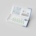 Open dental tool kit with green tools inside on a gray background